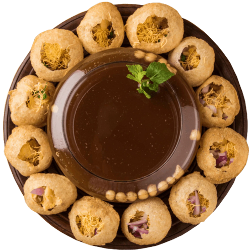 Red Leaf Indian Restaurant - Crispy puri with a bowl of tamarind and mint water in the center, served as starters